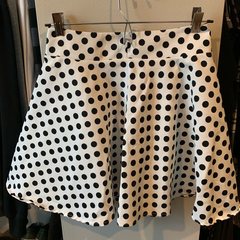 White w/ black polka dot skirt
